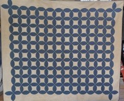 Geometric dark blue and white quilt