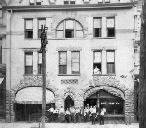 Men in front of Fordham Hotel Paris